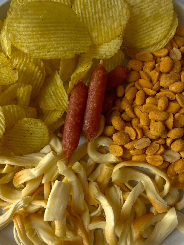 Чипси, сосиски, шоколадний десерт: Їжа, яка може викликати головний біль За слов...